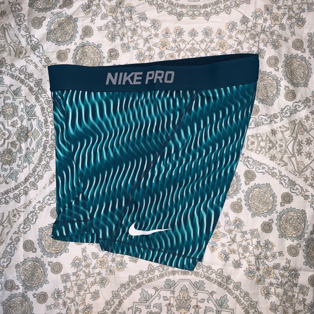 Nike Pro shorts, with blue “waves”